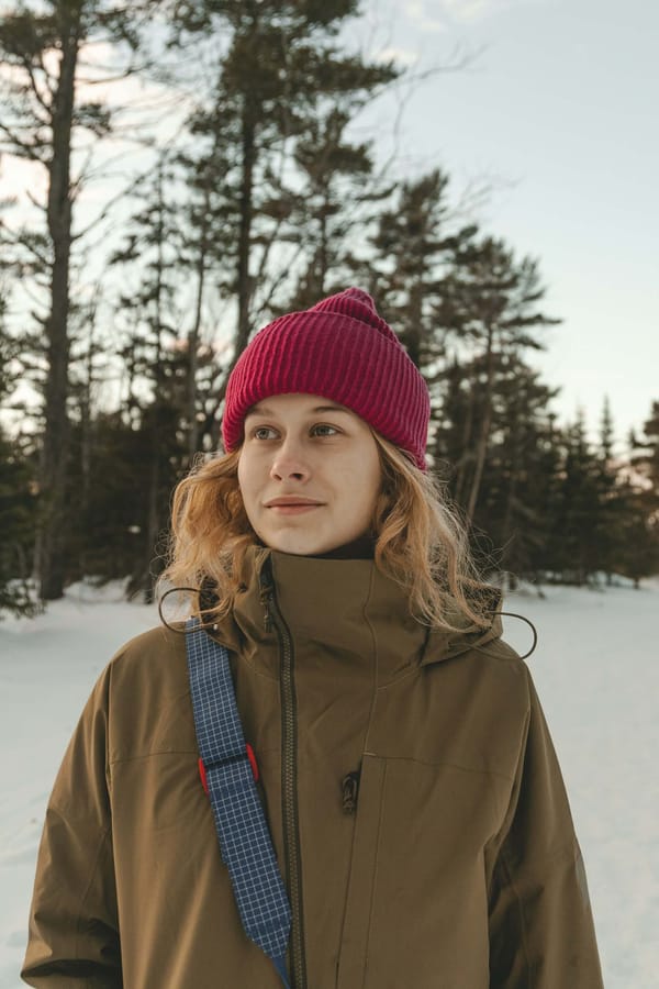 A Women Standing in snow