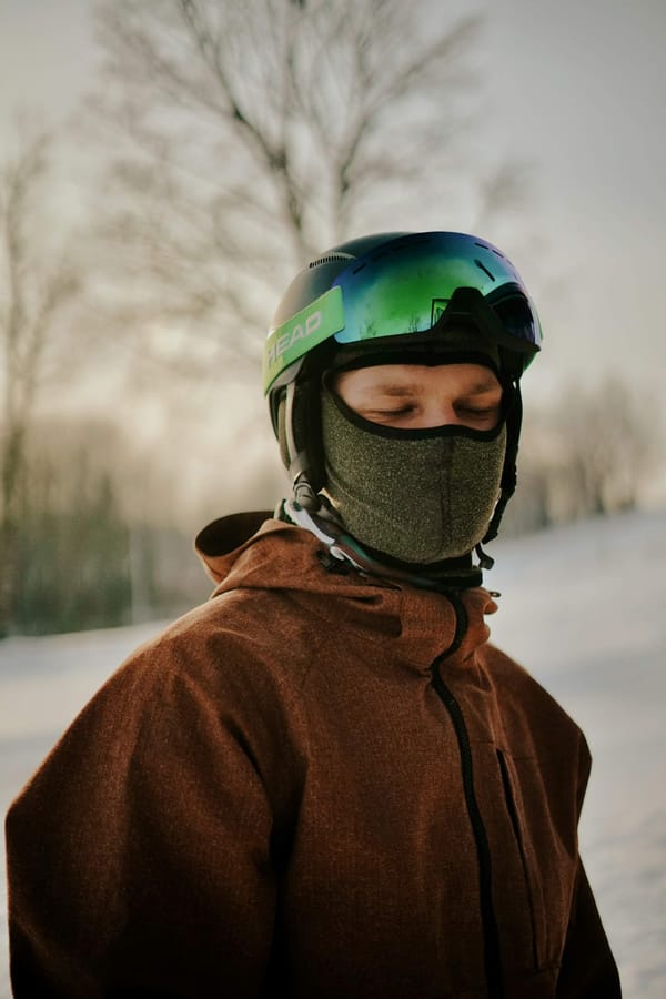 Snowboarder wearing helmet